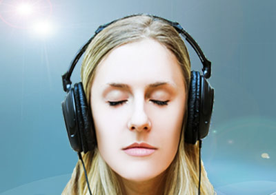 woman with headphones meditating