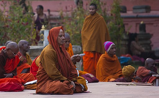 Buddhist men meditating in India