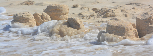 sand castle swept away